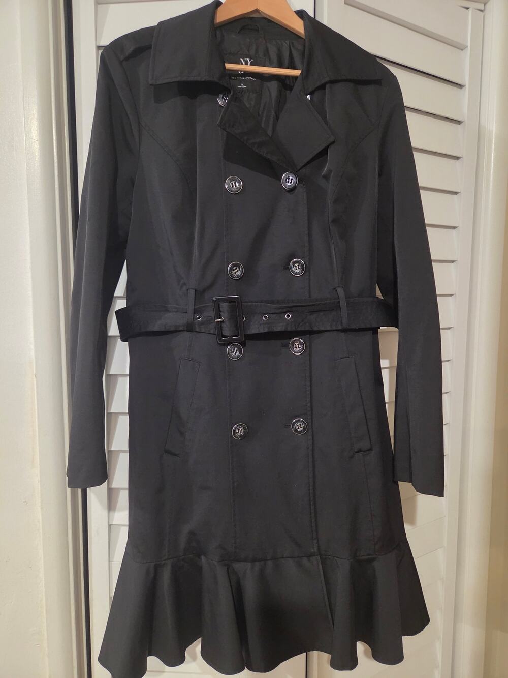 New york and company Xlarge belted trench coat with ruffled hem.
